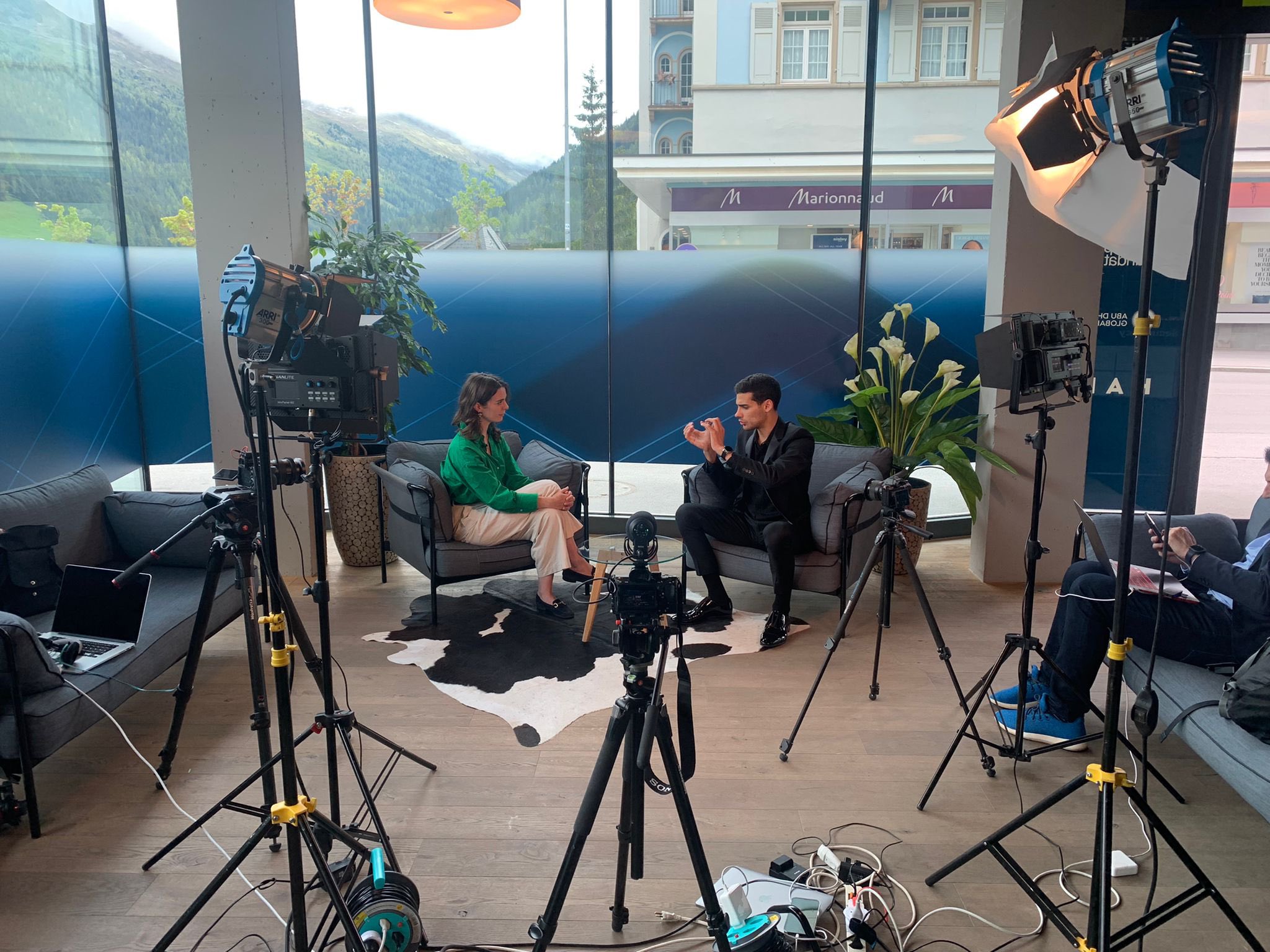 Image in @MarioNawfal's post: TV Interview at WEF 2022 while @nfttech was listing on @NEO_Exchange https://t.co/UNRQiRYj5z