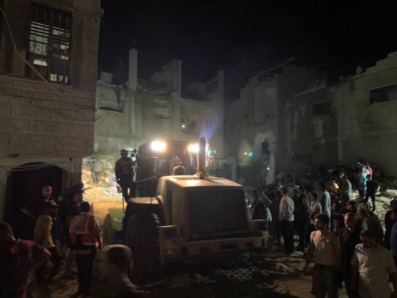 Image in @MarioNawfal's post: 🚨IMAGES: Civil defense teams search for survivors under the rubble in Khan Yunis.