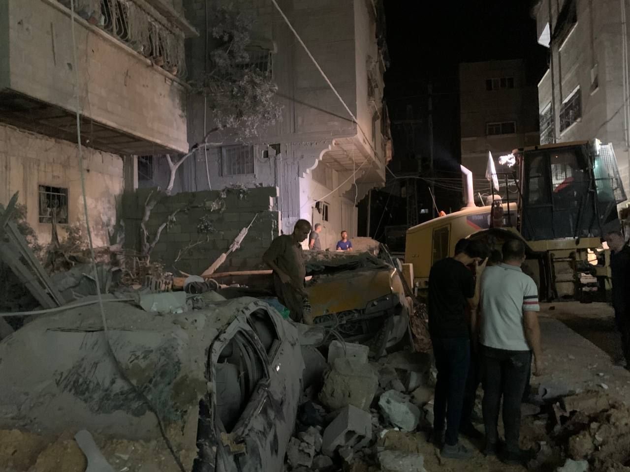 Image in @MarioNawfal's post: 🚨IMAGES: Civil defense teams search for survivors under the rubble in Khan Yunis.