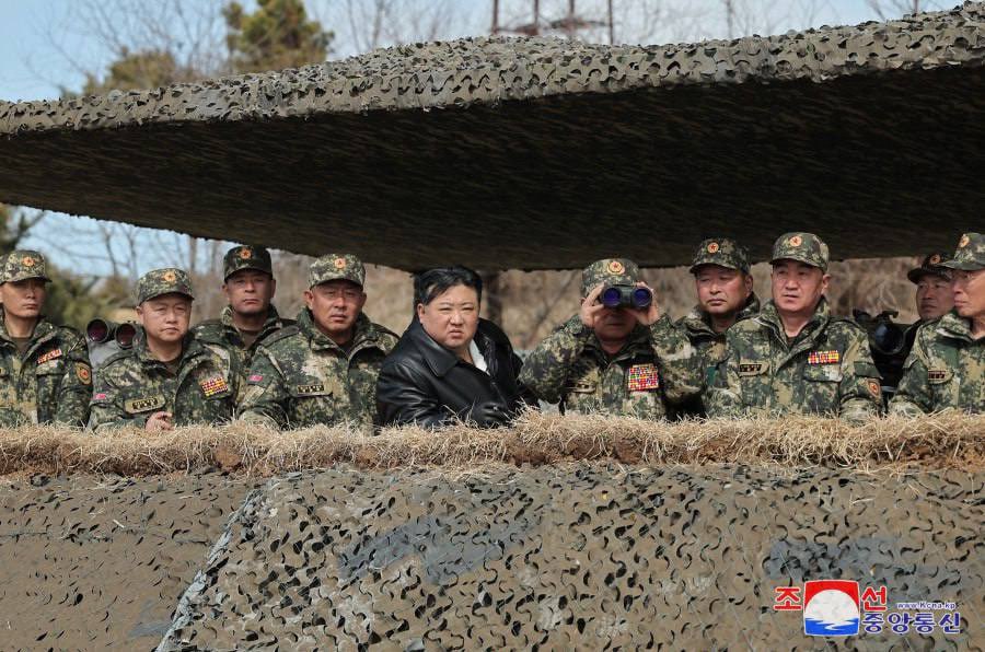 Image in @MarioNawfal's post: Kim has a new leather jacket… and long-range missiles. https://t.co/w20pJXV4vj