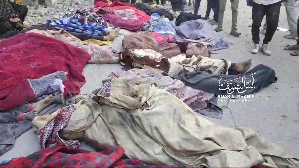 Image in @xIsraelExposedx's post: 77 martyrs ascended and dozens are missing as a result of the IOF bombing a five-story building fil…