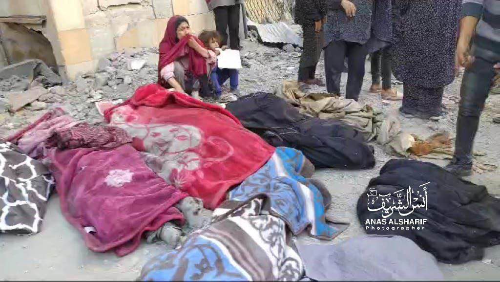 Image in @xIsraelExposedx's post: 77 martyrs ascended and dozens are missing as a result of the IOF bombing a five-story building fil…