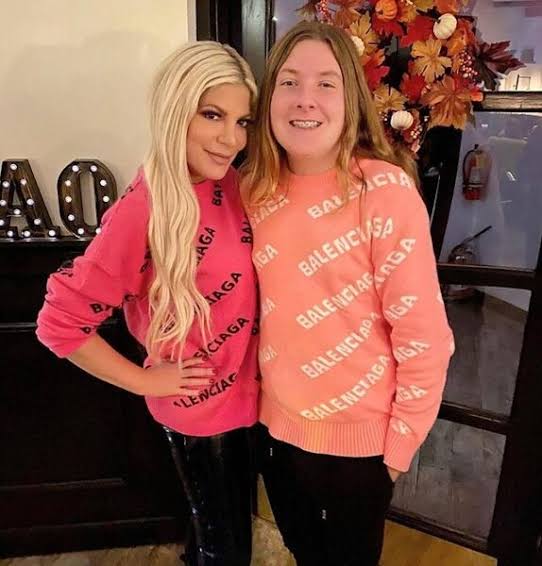 Image in @IfindRetards's post: Certified retard and celebrity, Tori Spelling and her trans son who now identifies as female.
Tor…