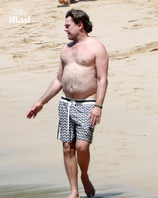 Image in @MarioNawfal's post: 🇺🇸 Leonardo DiCaprio just hit the beach shirtless, and the paparazzi made sure the ENTIRE INTERNET …